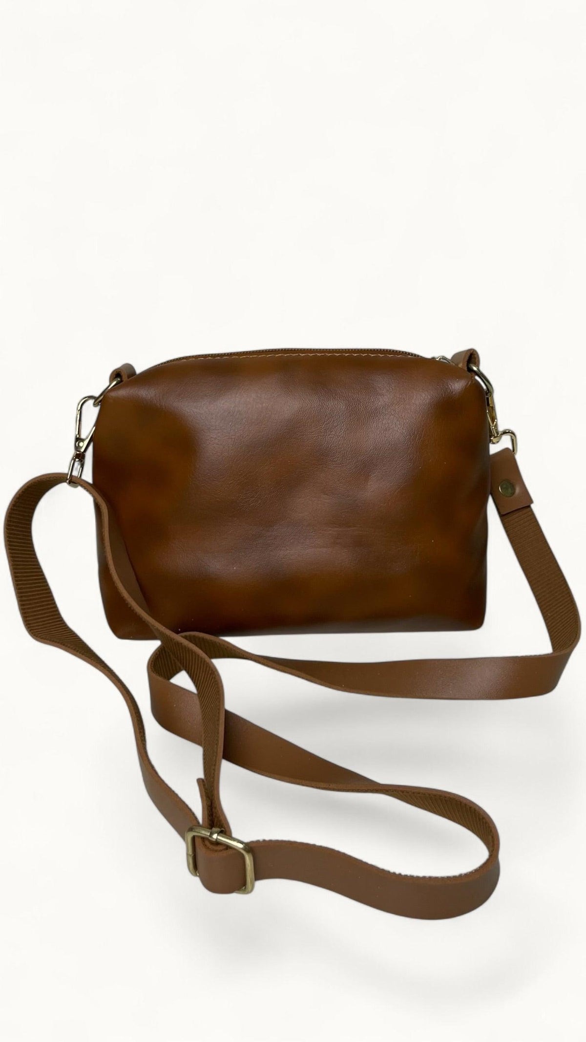 Brown handbag, wallet and pouch set by Charmé Pakistan