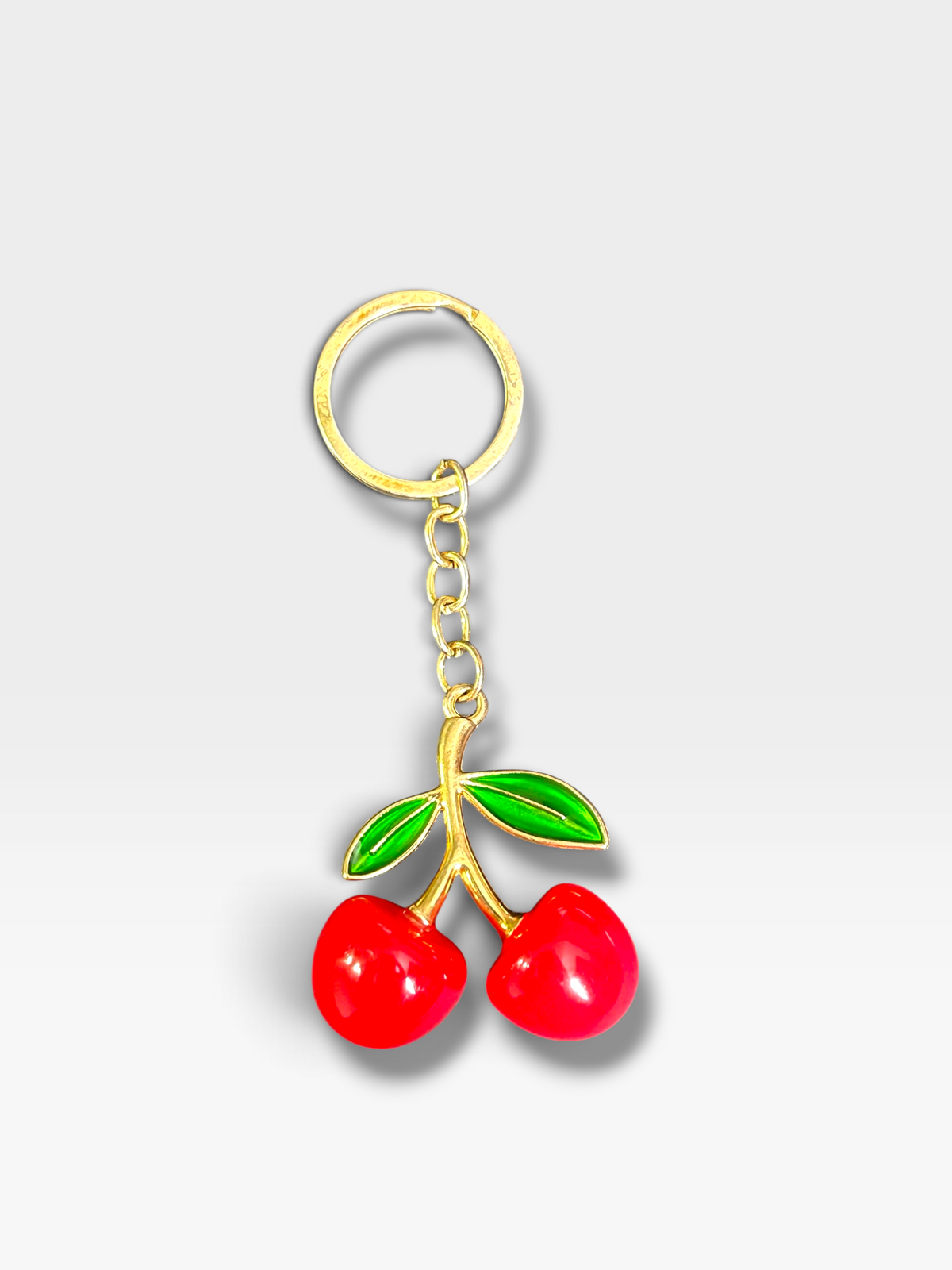 Cute cherry bag charm for keys and purses by Charmé