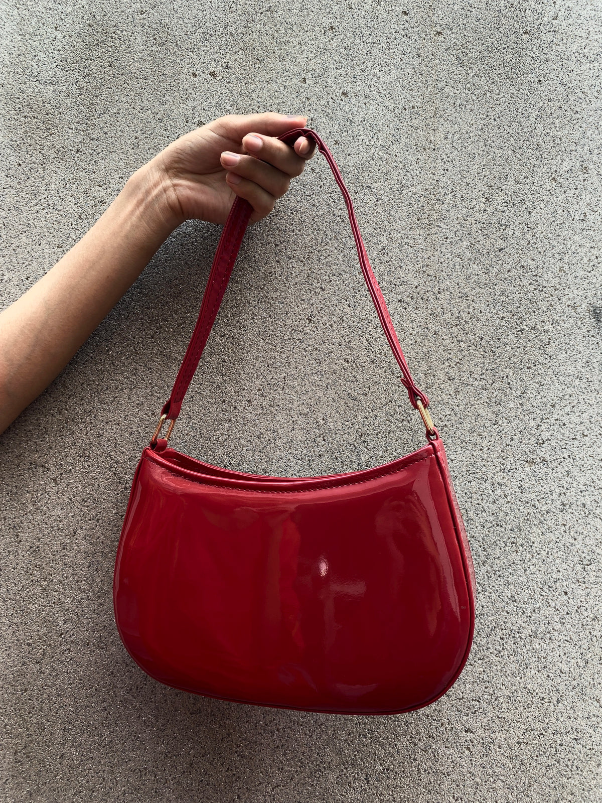 Charmé Bloom cherry red glossy shoulder bag with gold-tone hardware