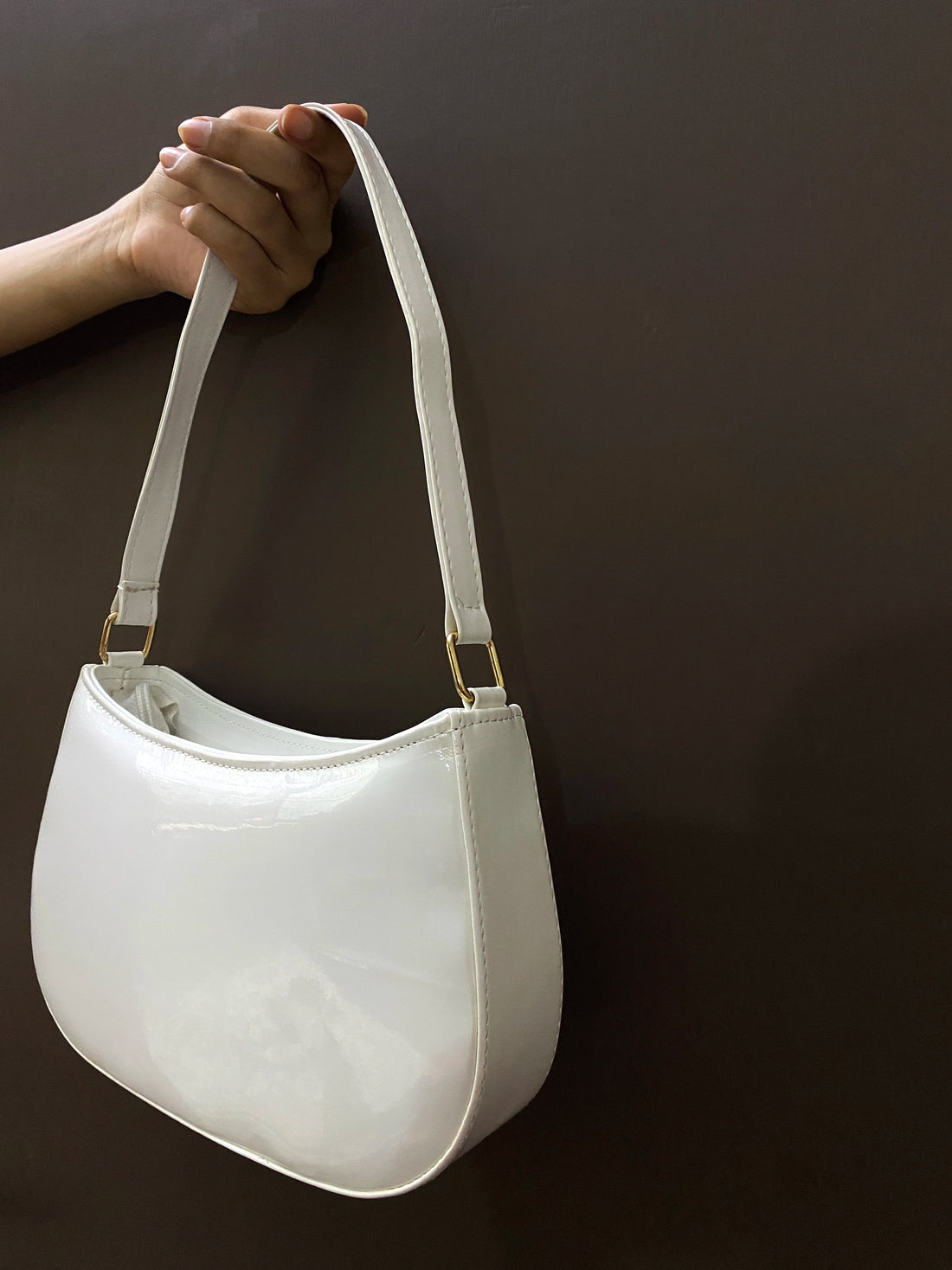 Charmé Bloom glossy white shoulder bag with gold-tone hardware