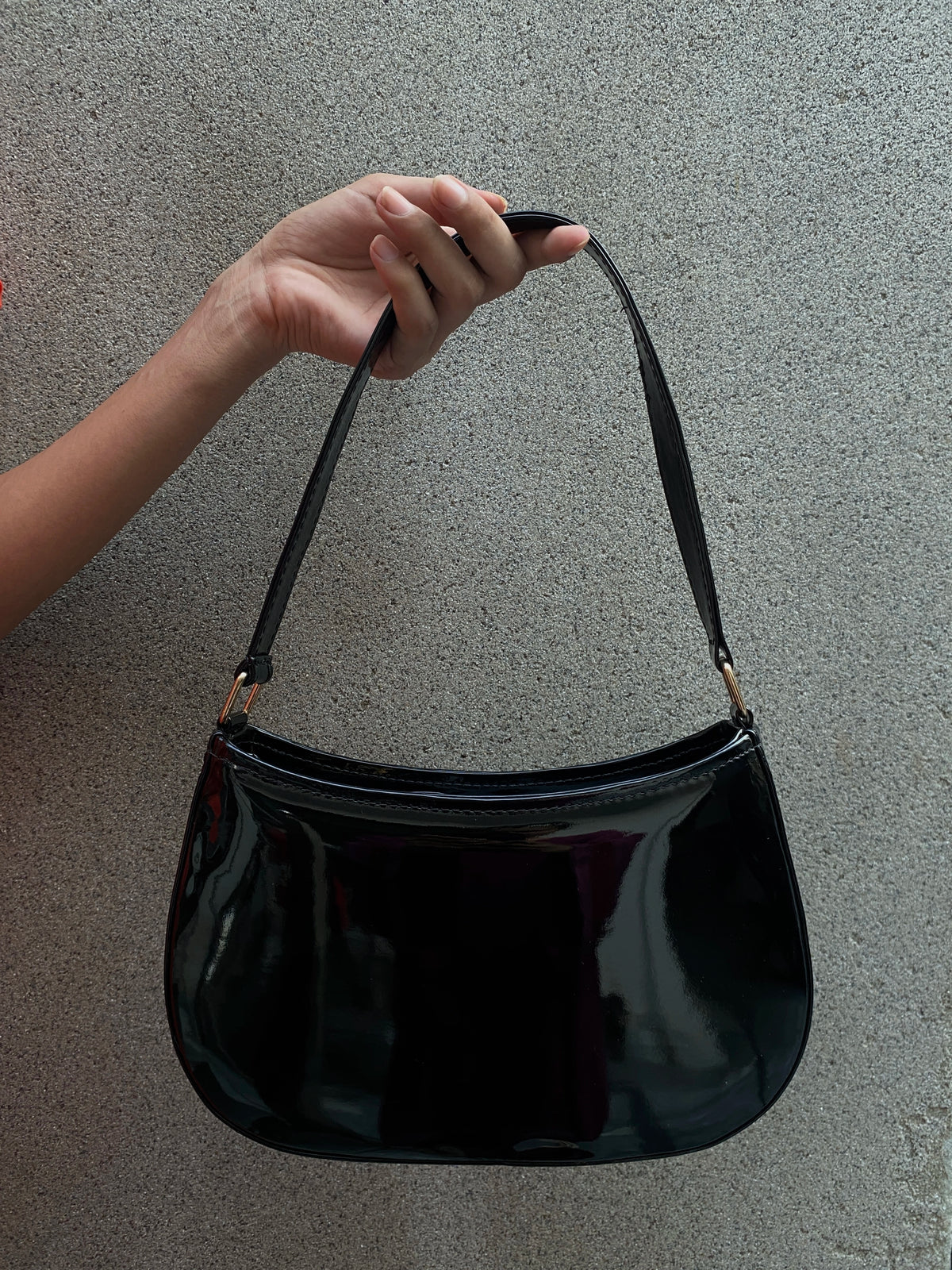 Charmé Bloom glossy black shoulder bag with gold-tone hardware